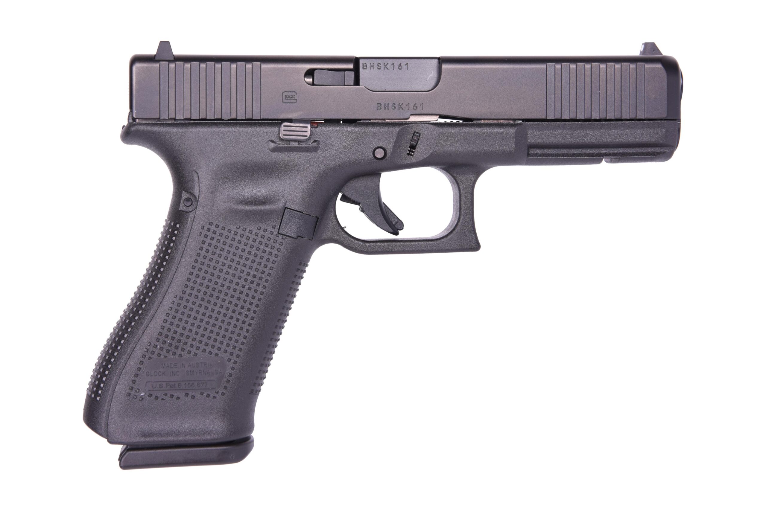 Black semi-automatic pistol on a white background.