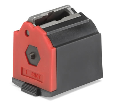 A red and black box with a gun on top of it.