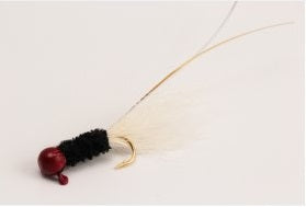 Fishing lure with lure tail and hook.