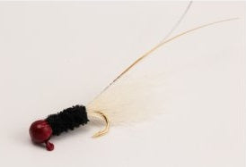 Fishing lure with white and black components.