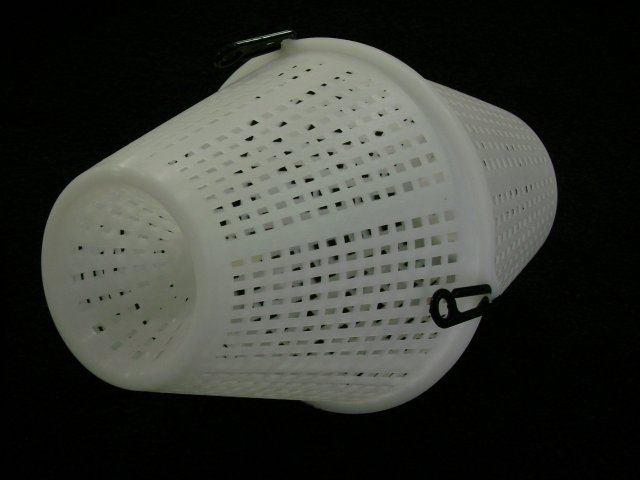 White plastic basket with a conical shape.