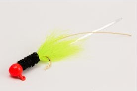 Fishing lure with vibrant green tuft.