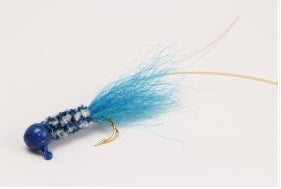 Blue fly fishing lure on white background.