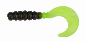 Green and black fishing lure with curl tail.