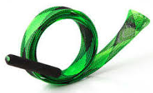 Green jump rope coiled on a surface.