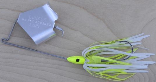 Fishing lure with silver body and yellow.