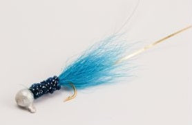 Fishing lure with blue feathers and hook.