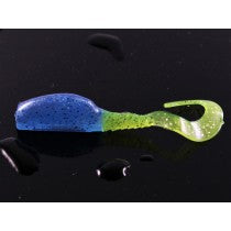 Blue and green fishing lure on black surface.